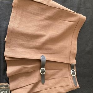 Tan skirt with accent buckles